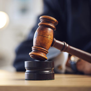 Judge's gavel resting on a block, symbolizing legal proceedings in Texas criminal cases